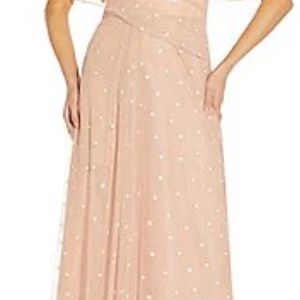 Size 18W New with tags. blush long dress. Has not been worn.